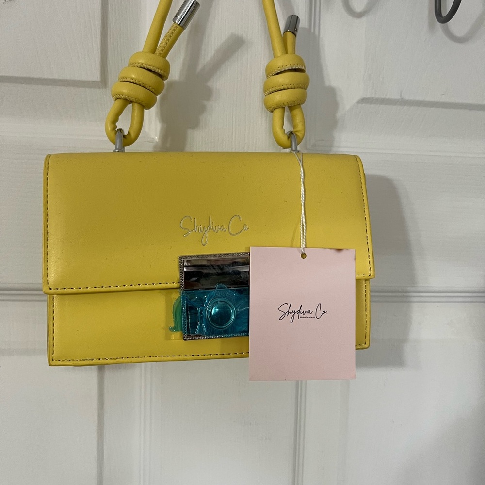 Vibrant Yellow Mini Bag with Structured Design and Eye-Catching Hardware